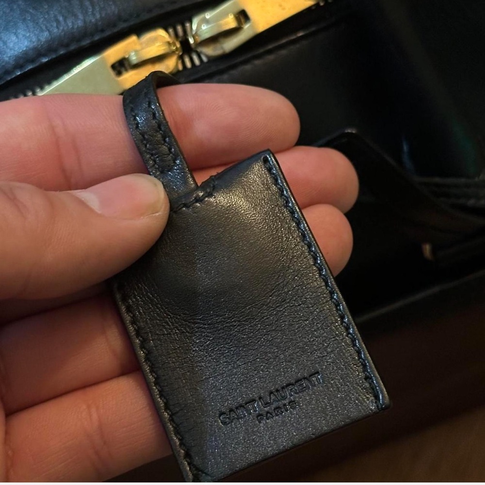 SAINT LAURENT Black leather duffle bag and crossbody - Picture 4 of 7